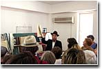 The excursion in the Synagogue Library. Rabbi Elkhanan Cohen is guiding it